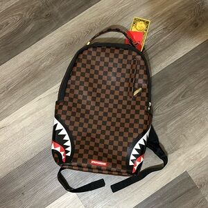 sprayground sip side shark backpack!